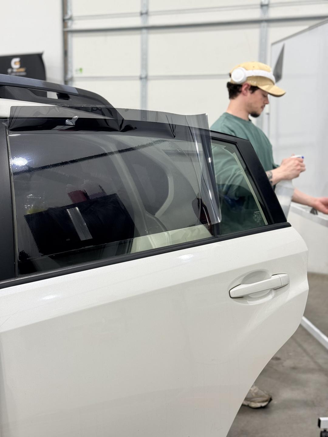 Rear door ceramic film on the liner during a Taggart Films install